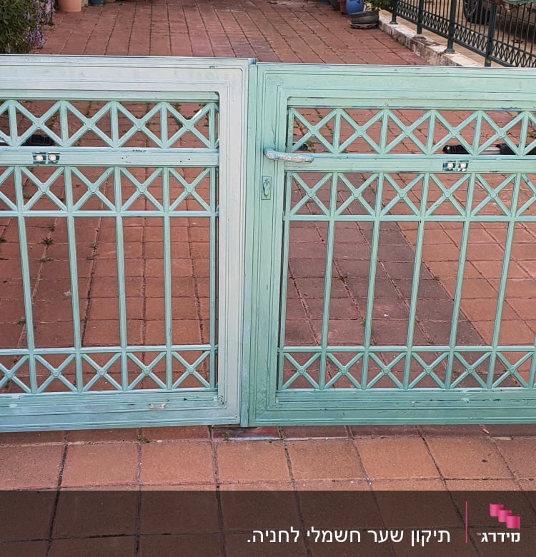 תיקון שער חשמלי לחניה.